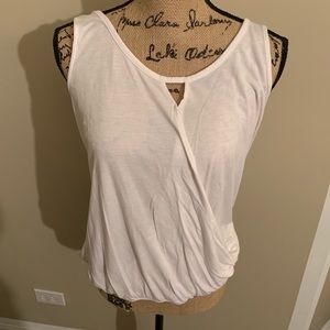 Size L white tank with cross front!